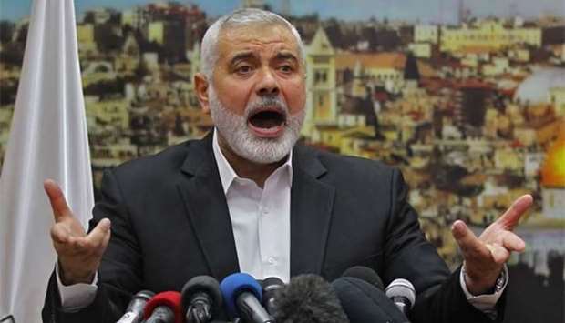 Hamas leader Ismail Haniyeh gestures as he delivers a speech over US President Donald Trump's decision to recognise Jerusalem as the capital of Israel, in Gaza City on Thursday.
