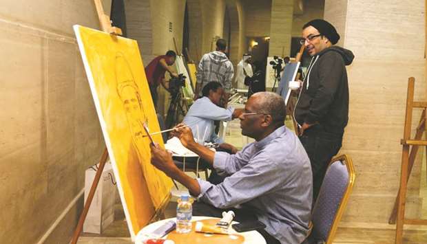 Artists at work at Katara in preparation for the event.