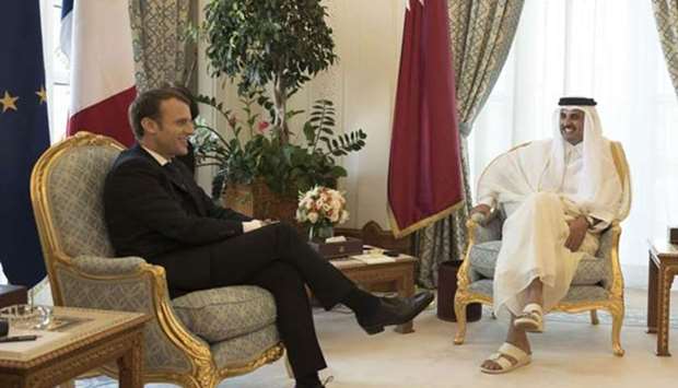 His Highness the Emir Sheikh Tamim bin Hamad al-Thani with French President Emmanuel Macron at the Emiri Diwan on Thursday.