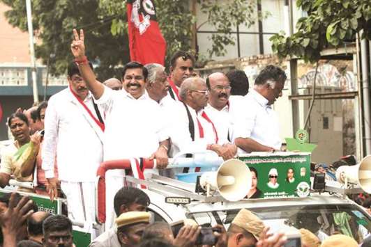 Tamil Nadu Chief Minister K Palaniswami and O Panneerselvam campaign for the All India Anna Dravida Munnetra Kazhagam ahead of the December 21 by-election to Radhakrishnan Nagar Assembly constituency in Chennai yesterday.