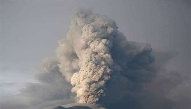 Mount Agung volcano is seen erupting late last month.