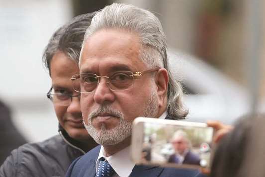 Indian tycoon Vijay Mallya arrives at Westminster Magistrates Court in central London on Thursday. The 61-year-old is currently in the middle of a two-week extradition hearing in a bid to avoid being sent back to his home country to face fraud and money laundering charges.