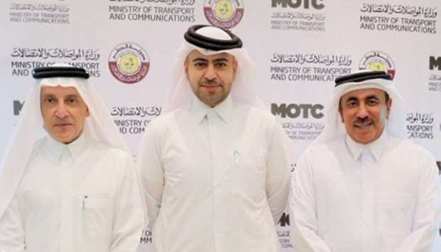 Mohamed al-Jefairi poses with HE the Minister of Transport and Communications Jassim Seif Ahmed al-Sulaiti and Qatar Airways Group chief executive Akbar al-Baker.
