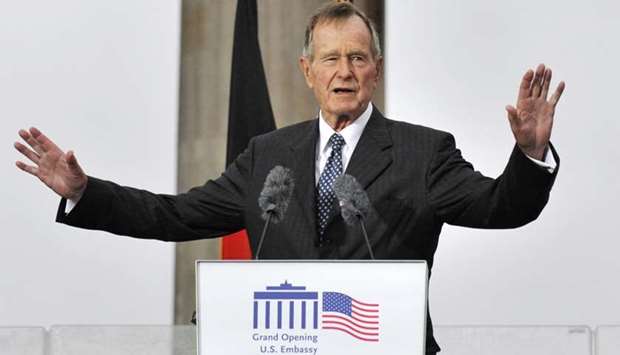 In this file photo taken on July 04, 2008 Former US president George Bush addresses guests during a ceremony to inaugurate the new US embassy building in Berlin