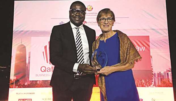 Dr Damilola S Olawuyi receiving the award.