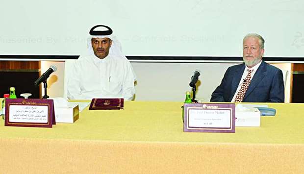 Qicca board member for International Relations Dr Thani bin Ali al-Thani and Astad contract specialist Paul Mallon during the seminar at the Qatar Chamber headquarters in Doha.