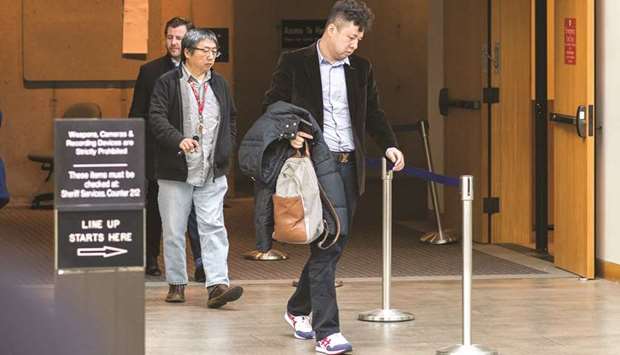 Liu Xiaozong, husband of Huawei Technologies CFO Wanzhou Meng, enters the courtroom as the hearing for Meng continued at the Supreme Court in Vancouver yesterday. Justice William Ehrcke of the British Columbia Supreme Court voiced doubts that Xiaozong could act as her u201csuretyu201d u2014 that is, a type of guarantor or u201ccommunity jaileru201d who would be responsible for ensuring she meets bail terms.