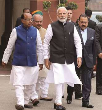 Prime Minister Narendra Modi arrives for the first day of the winter session of the parliament in New Delhi yesterday.