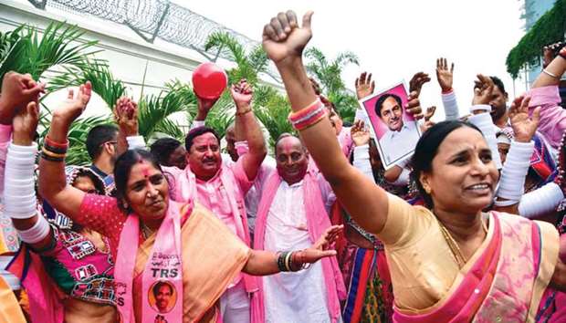 Telangana Rashtra Samiti (TRS) party members celebrate after their party won the Telangana assembly elections in Hyderabad yesterday.