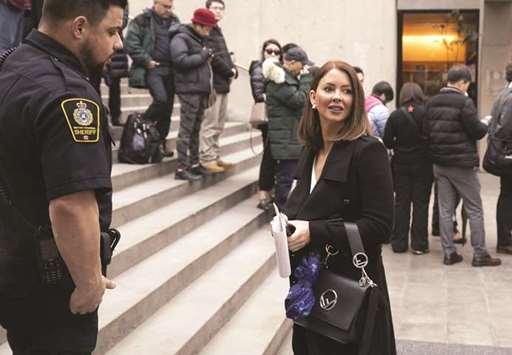 Sarah Leamon, a member of the Huawei Technologies legal team applying for bail for Huawei CFO Meng Wanzhou, speaks to a sheriff at BC Supreme Court prior to the start of proceedings in Vancouver, Canada.