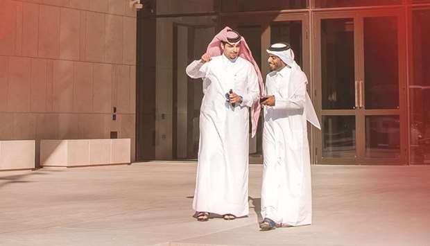 Vodafone Qatar CEO Sheikh Hamad Abdulla Jassim al-Thani (left) and Msheireb Properties acting CEO Ali al-Kuwari touring Msheireb Downtown Doha.