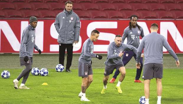 Bayern Munich players take part in a training session at the Amsterdam Arena, on the eve of the  UEFA Champions League football match against Ajax in Amsterdam yesterday. (AFP)