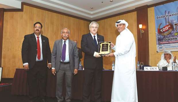 The Excellence in Professional Leadership award being given to Nasser Jeham al-Kuwari by Brian J Curtis.