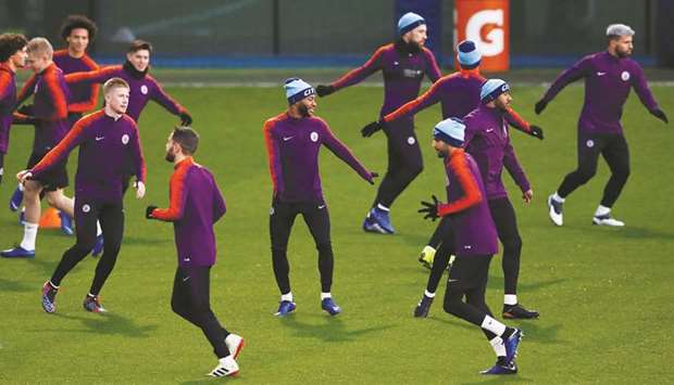 Manchester Cityu2019s Raheem Sterling (centre) trains with teammates in Manchester yesterday.  (Reuters)