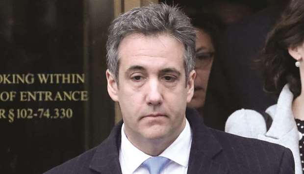 Michael Cohen exits the court house after his sentencing in New York yesterday.