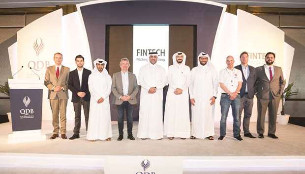Al-Mana and other dignitaries during QDBu2019s u2018Fintech Pitching & Coaching Dayu2019 held in Doha yesterday.