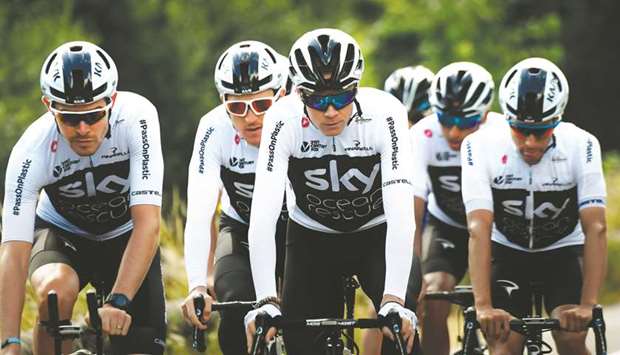 In this July 6, 2018, photo, British riders Christopher Froome (front centre), Luke Rowe (left), Geraint Thomas (second rear) and their Team Sky teammates ride during a training session near Saint-Mars la Reorthe, western France, on the eve of the start of the 105th edition of the Tour de France. (AFP)