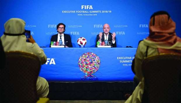 Fifa president Gianni Infantino speaks during a news conference in Doha