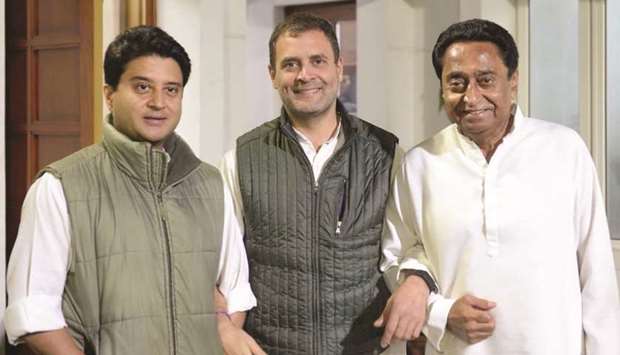 Congress President Rahul Gandhi meets party leaders Kamal Nath and Jyotiraditya Scindia in New Delhi yesterday.