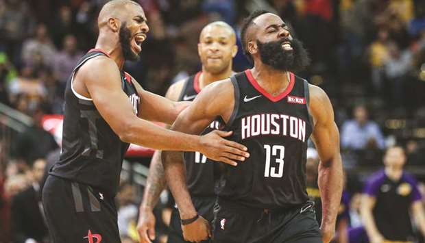 Houston Rockets guard James Harden (right) celebrates with guard Chris Paul after scoring a basket during the fourth quarter against the Los Angeles Lakers at Toyota Center. PICTURE: USA TODAY Sports