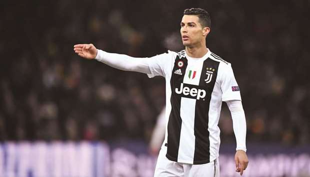 Juventusu2019 Portuguese forward Cristiano Ronaldo reacts during their UEFA Champions League group H football match against Young Boys at the Stade de Suisse stadium on December 12.