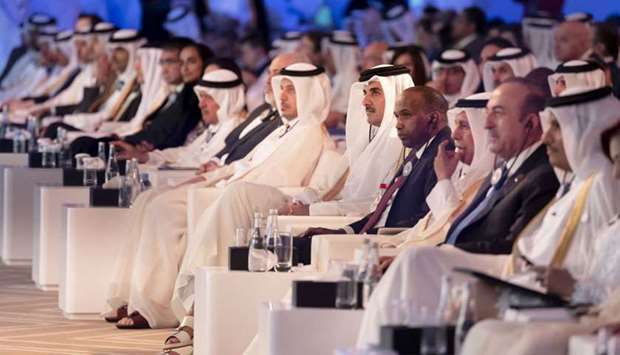 His Highness the Amir Sheikh Tamim bin Hamad al-Thani, HE the Prime Minister and Minister of Interior Sheikh Abdullah bin Nasser bin Khalifa al-Thani, HE the Shura Council Speaker Ahmed bin Abdullah bin Zaid al-Mahmoud, and ministers and heads of diplomatic missions at the opening of Doha Forum 2018.