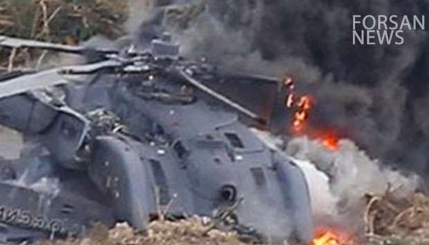 A picture of the crashed helicopter after it caught fire posted on social media by Forsan News