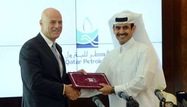 HE Saad Sherida al-Kaabi with Claudio Descalzi, CEO, Eni following the announcement that Qatar Petroleum has entered into an agreement with the Italian energy major to acquire a 35% participating interest in three offshore oil Fields in Mexico. Picture: Thajuddin