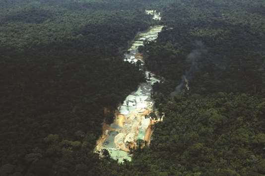 An illegal cassiterite mine is seen during an operation conducted by agents of the Brazilian Institute for the Environment and Renewable Natural Resources, or Ibama, in national parks near Novo Progresso, southeast of Para state, Brazil.