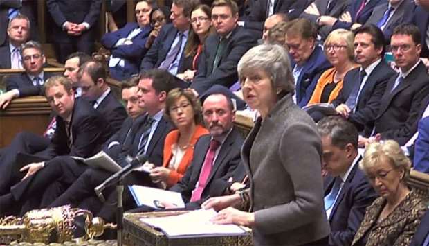 A video grab from footage broadcast by the UK Parliament's Parliamentary Recording Unit (PRU) Britain's Prime Minister Theresa May as she makes a statement to the House of Commons in London