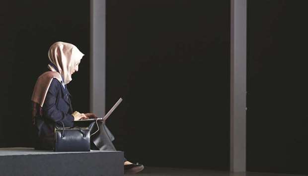 A delegate uses a laptop computer during the 9th World Islamic Economic Forum (WIEF) in London in this file photo dated October 30, 2013. The UK comes on top of a list of Islamic finance knowledge providers, with 80 institutions providing courses on the matter in the country as per 2017.