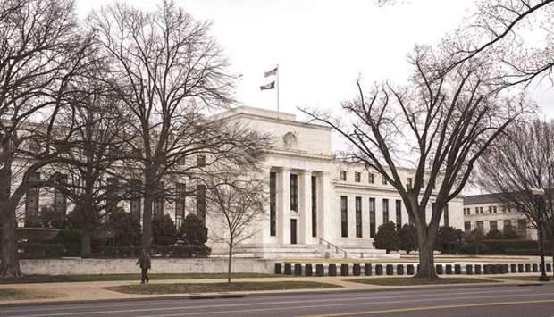 The Federal Reserve building in Washington, DC. The Fed is expected to increase one of the rates it uses to help guide the top of the policy band by a bit less, echoing a similar action taken in June.