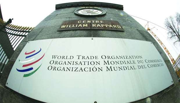 The WTO logo is pictured at the entrance to its headquarters in Geneva