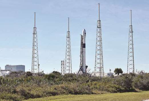 The SpaceX Falcon 9 rocket, scheduled to launch a US Air Force navigation satellite, sits on Launch Complex 40 after the launch was postponed after an abort procedure was triggered by the onboard flight computer.