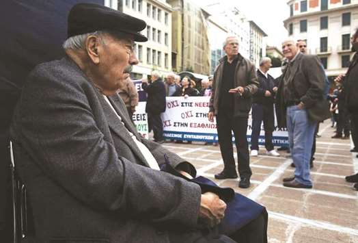 Pensioners participate at a demonstration in central Athens, Greece, on 20 November 2018, protesting over pension cuts and demanding the refund of losses due to austerity measures.
