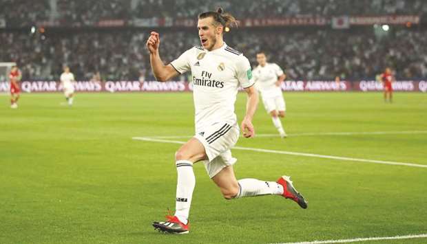 Real Madridu2019s Gareth Bale celebrates after scoring in the Club World Cup semi-final against Kashima Antlers in Abu Dhabi yesterday. (Reuters)
