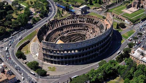 Shows the Coliseum (Colosseum, Colosseo) in Rome