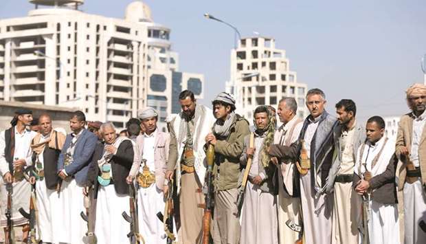 Armed Houthi followers attend a gathering to show support for their movement in Sanaa, yesterday.