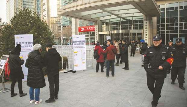 Customers (left and centre) come to claim their deposit money, outside Ofo headquarters in Beijing. A tech start-up darling after its launch in 2014, Ofo attracted major funding from Chinese and international investors and had been valued at more than $2bn. In a swift reversal the firm, which claims 200mn users, now appears on the skids, with nearly 11mn customers demanding the return of their deposits.