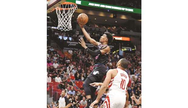 Miami Heatu2019s Josh Richardson (left) drives to the basket as Houston Rocketsu2019 Eric Gordon looks on during the second half of the NBA game in Miami on Thursday. (USA TODAY Sports)