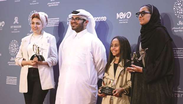 Award-winners Mariam al-Dhubhani, Mohamed al-Mahmeed, Fatma al-Nahdi and Amal al-Muftah at the Made in Qatar Award Ceremony during the Ajyal Film Festival on Saturday.