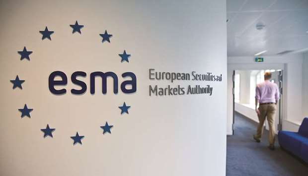 A visitor passes a sign in the lobby of the European Securities and Markets Authorityu2019s headquarters in Paris (file). The ESMA has warned that firms wishing to keep  offering their services in the EU u201cmust have a fully authorised legal entityu201d inside the bloc by March 30.