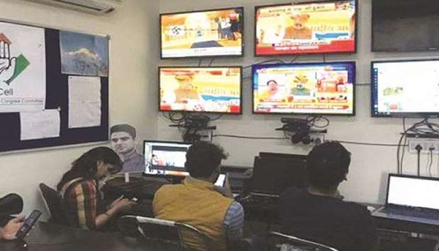 Volunteers of Indiau2019s main opposition Congress party monitor TV news channels and social media inside their war room which was setup for a state assembly election, in Jaipur in the desert state of Rajasthan, on December 3.