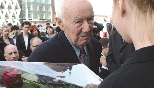 This file photo taken on April 18, 2013, shows Rotem being welcomed as he revisits the sewer through he and dozens of comrades escaped the Nazis 70 years ago.