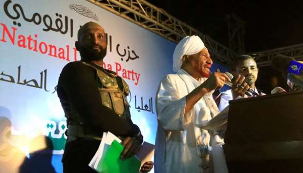 Sudanese leading opposition figure Sadiq al-Mahdi addresses his supporters after he returned from nearly a year in self-imposed exile in Khartoum, Sudan
