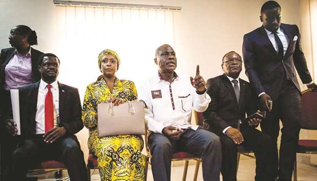 One of the main opposition candidates in the Democratic Republic of the Congou2019s presidential elections to be held on December 30, Martin Fayulu (centre), gestures as he waits to address the press in Kinshasa yesterday.