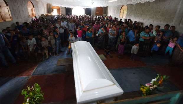 People attend a mass before the funeral of Guatemalan seven-year-old Jakelin Caal, who died in a Texas hospital two days after being taken into custody by US border patrol agents in a remote stretch of the New Mexico desert