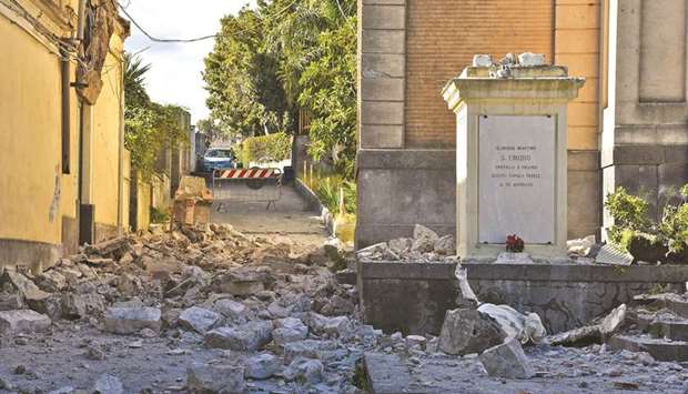 The destroyed statue of Saint Emidio, known as the protector against earthquakes, is pictured in Pennisi yesterday after a 4.8-magnitude earthquake hit the area around Europeu2019s most active volcano Mount Etna.