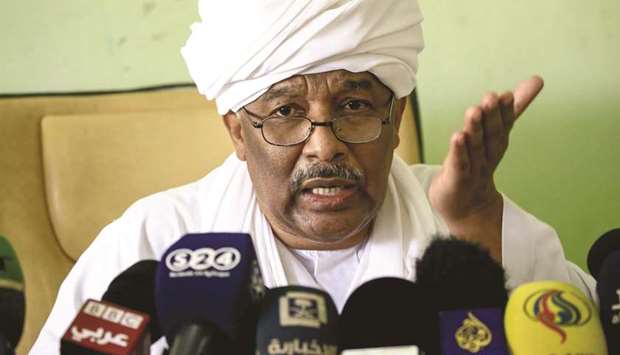 Idris Suleman, Sudanu2019s minister of international co-operation and political secretary of the Popular Congress Party, speaks during a press conference at the partyu2019s headquarters in Khartoum, yesterday.
