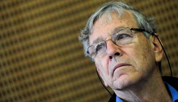 Israeli writer Amos Oz listens to a journalist's question during his press conference of the 17th International Book Festival (IBF) in the Millenaris Culture Center of Budapest. File photo taken April 23, 2010